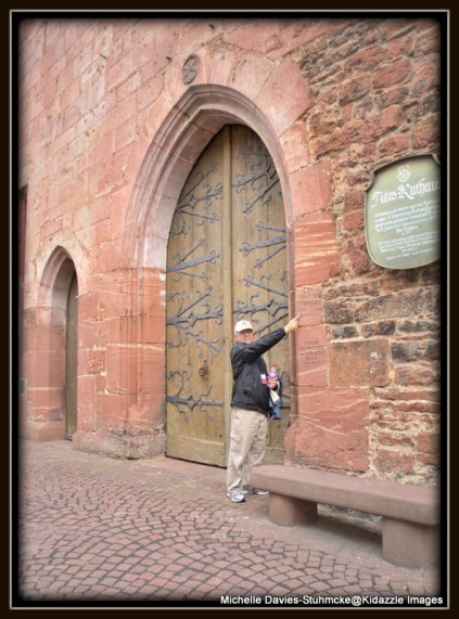 Beautiful old doorway with flood levels on wall beside, in Miltenberg,Germany